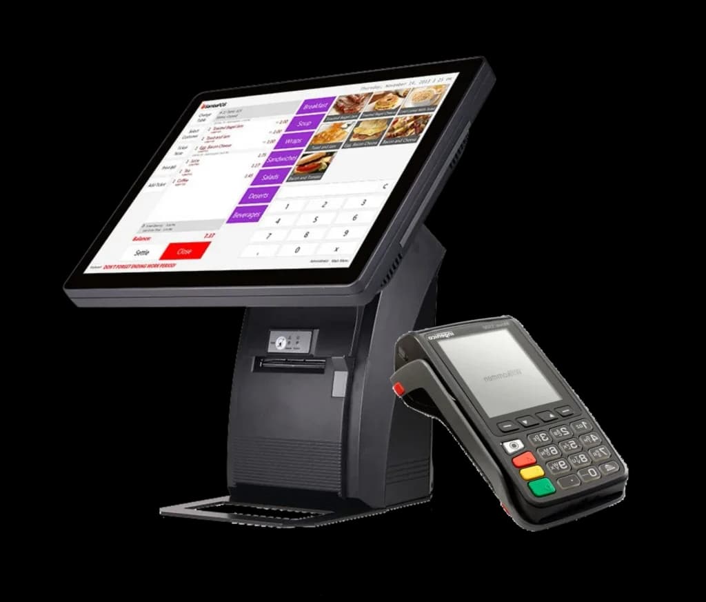 Caisse tactile avec terminal de paiement posée sur un comptoir de commerce